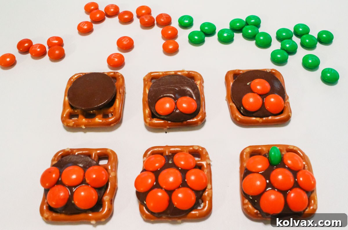 Image showing the steps for creating a Pumpkin Pretzel Bite with M&M's.