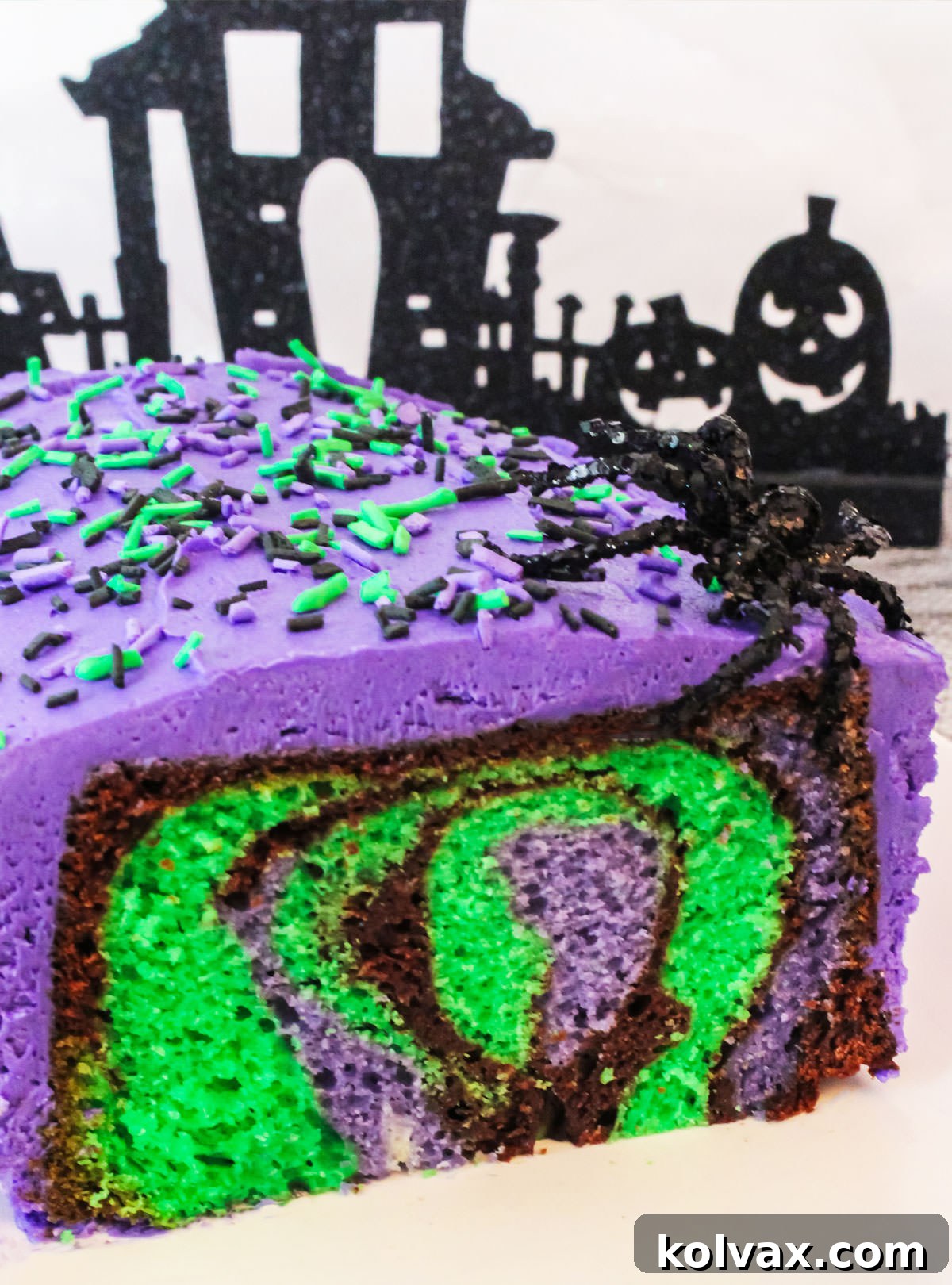 Closeup on a Bewitched Marble Cake cut open to show the inside marbling effect.