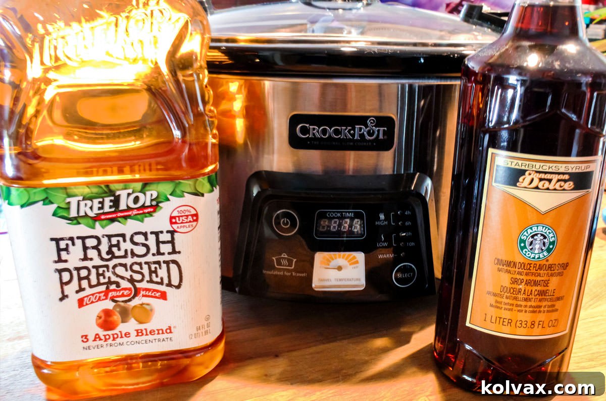 Apple Cider, Cinnamon Syrup and a Crock pot are the things you need to make Caramel Apple Cider.