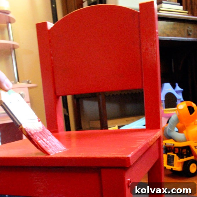 Painting an Ikea Chair with vibrant red paint