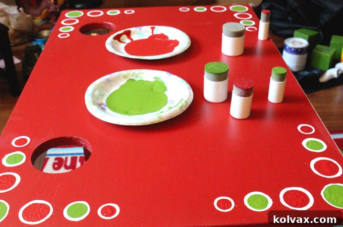 Adding painted circle embellishments to the DIY Kid's Homework Desk