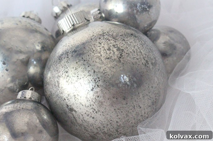 Beautiful array of sparkling DIY Mercury Glass Christmas Tree Ornaments