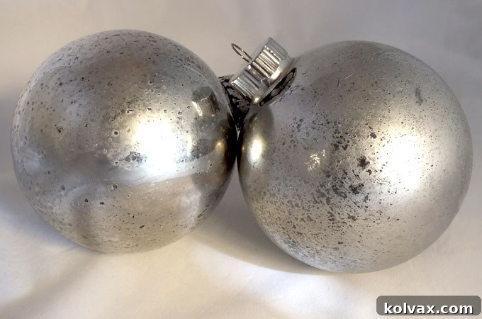 Close-up of a clear glass ornament being prepared for the mercury glass technique