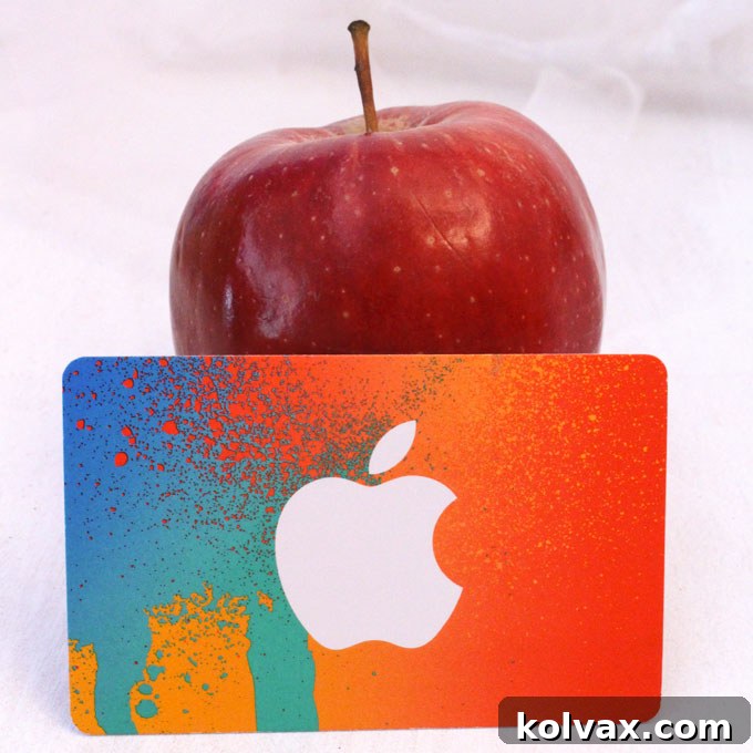 An Apple iTunes Gift Card, combining practical utility with your apple-themed teacher appreciation gift.