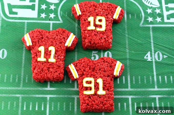 Kansas City Chiefs Rice Krispie Treat Jerseys on a white background with footballs