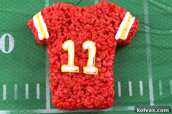 These Kansas City Chiefs Rice Krispie Treats Team Jerseys are a fun football dessert for a game day football party, an NFL playoff party, a Super Bowl party or as a special snack for the Kansas City Chiefs' fans in your life. Go Chiefs! And follow us for more fun Super Bowl Food Ideas.