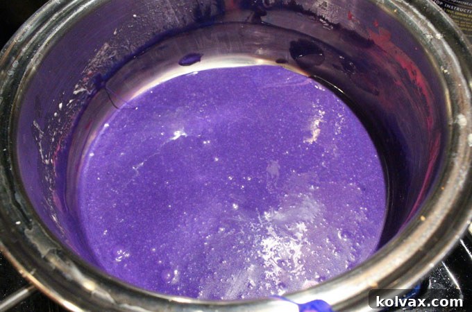 Marshmallow mixture expertly tinted to a rich Minnesota Vikings purple using a precise combination of food colorings.