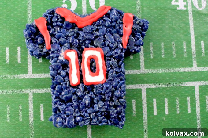 Decorated Houston Texans Rice Krispie Treat jerseys, showcasing team colors and numbers.