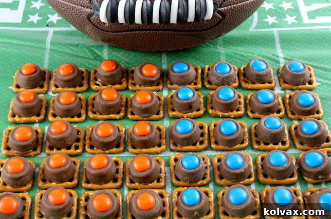 Delicious Denver Broncos Pretzel Bites with orange and blue M&Ms, ready for game day
