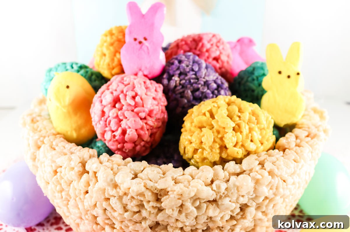 A stunning Rice Krispie Treat Easter Basket Centerpiece overflowing with colorful Rice Krispie Treat eggs and fluffy peeps, displayed elegantly on a crisp white table. The perfect blend of a fun Easter craft and a delicious treat.