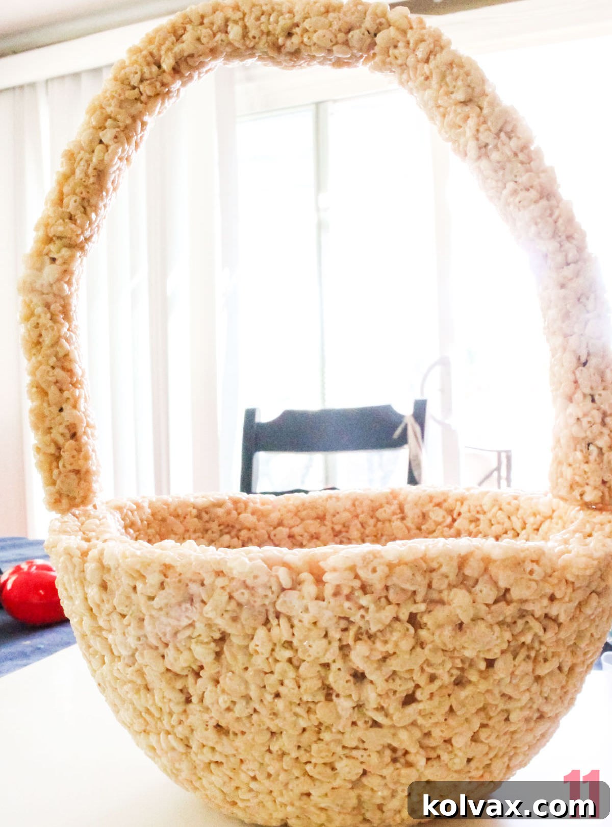 A detailed close-up of the completed, unadorned Rice Krispie Easter Basket, showcasing its sturdy construction and readiness for decoration and filling.